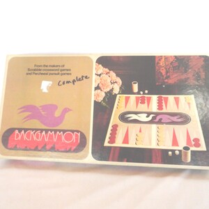 May include: Complete Backgammon game box. The box features a bird logo and the game's name in red. The right side of the box shows the game board with pieces and dice. The box is tan and brown.