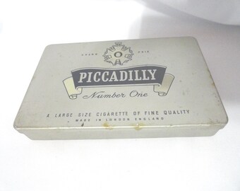 can you still buy piccadilly cigarettes Vintage Piccadilly Cigarette Tin, Made in England, Tobacciana, Flat Hinged,  1960s, Number One