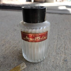 Vintage French Mustache Talc Powder Bottle Marcel Rochas Paris Miniature Collectible Vanity Bathroom Black Plastic Screw Cap France 1950s