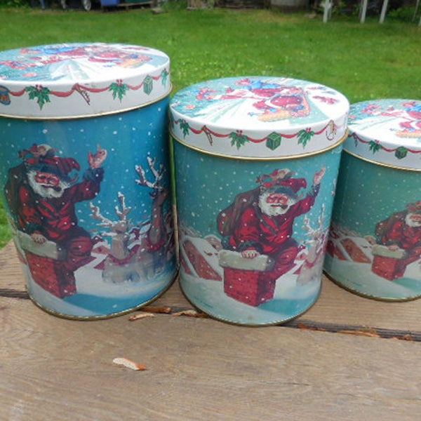 Vintage Set of 3 Christmas Nesting Tins Santa Holly Drums Trumpet Deer Sleigh 1970s 1980s Matching Blue Red Christmas Decor Made in Taiwan