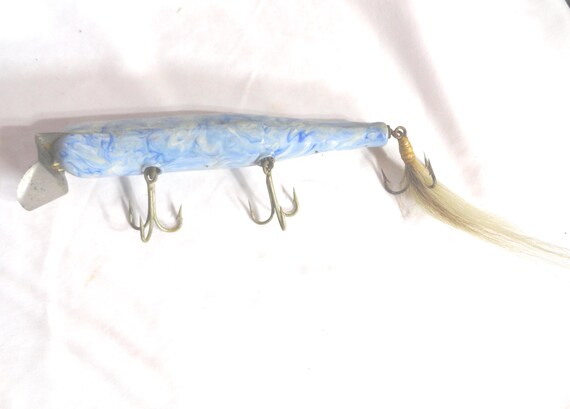 atom popper fishing lure Atomizer If you dont have one you should Featured Lure: Atom Striper Swiper