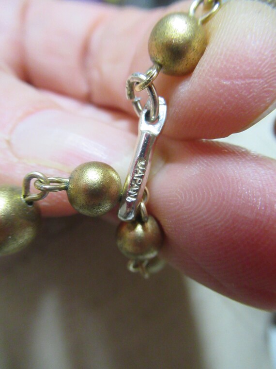 VINTAGE TRIPLE STRAND NECKLACE