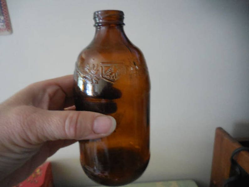 Vintage 1960s Brown/Amber Beer Bottle Embossed Birds Etsy