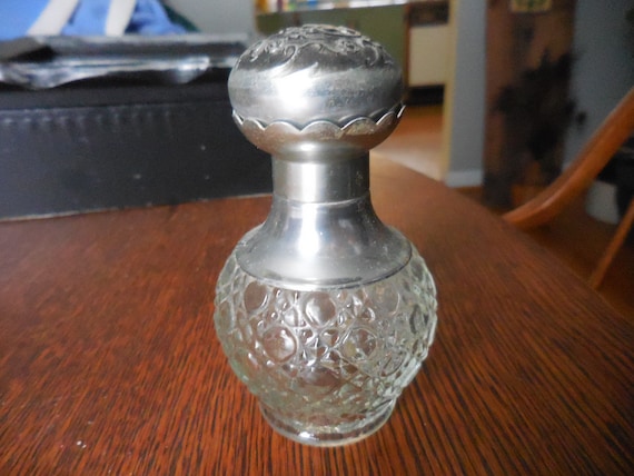 Vintage 1960s to 1970s Avon Perfume Avon perfume glass bottle with red cap