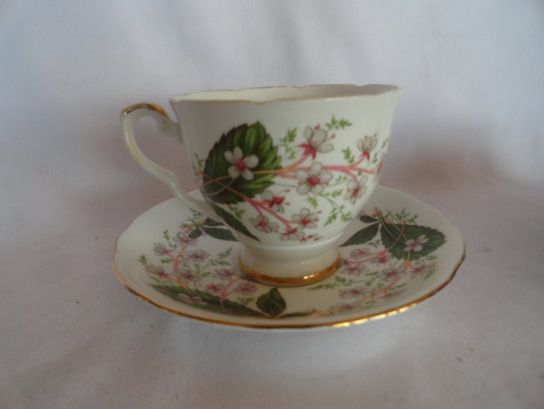 Vintage Royal Stafford Teacup & Saucer Set Bone China Made in England Light Pink Small Flowers Gold Trim Green Leaves Display image 2