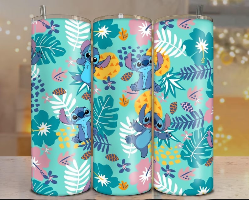 May include: A teal tumbler featuring a repeating pattern of the character Stitch from Lilo & Stitch, tropical flowers, and foliage. The design includes Stitch in various poses, set against a backdrop of pink, yellow, and white floral elements and green leaves. A silver straw is visible.