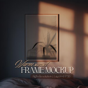 May include: A framed art print mockup with a warm sunset aesthetic. The artwork features a silhouette of a plant and a glass, with a window shadow. The frame is made of wood. The text "Warm sunset FRAME MOCKUP" is displayed.