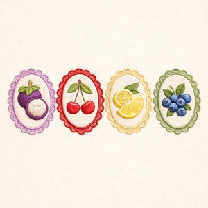 May include: Four embroidered oval patches featuring fruit designs. Includes a purple mangosteen, two red cherries, sliced lemons, and a cluster of blueberries. Each patch has a scalloped border in coordinating colors, set against a white background.