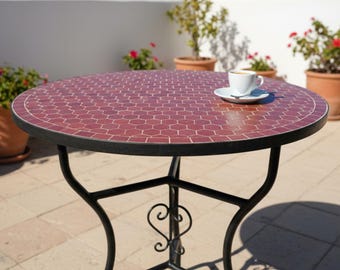 Handmade Moroccan terracotta hexagon mosaic round table top red clay honeycomb pattern cream grout dark metal frame Fez artisan