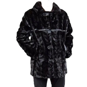 May include: A black faux fur coat with a notched collar and three button closures. The coat features a horizontal leather-like accent across the chest and is shown on a mannequin. The coat is a medium length.