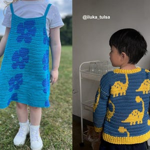 May include: A turquoise crochet dress with blue floral designs. The dress has a simple, sleeveless design with shoulder straps. The child is wearing white sneakers. The dress is handmade and suitable for children.