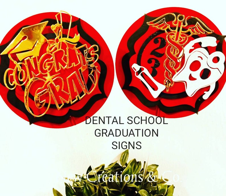 May include: Two red and black circular signs with gold accents. The first sign says "Congrats Grad" with a graduation cap. The second sign has a caduceus and a tooth with a toothbrush. The text below the signs reads "Dental School Graduation Signs".