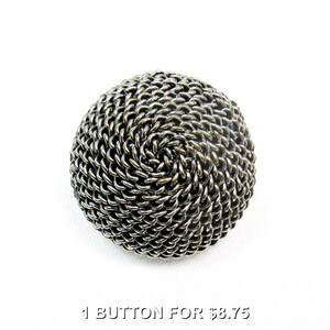 May include: A round, silver-toned button with a woven chainmail design. The button is centered on a white background. The text "1 BUTTON FOR $8.75" is at the bottom of the image.