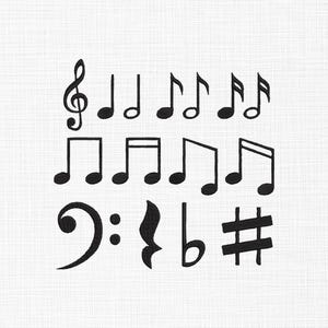 May include: A collection of black musical symbols embroidered on a white fabric background. The set includes a treble clef, various quarter and eighth notes, a bass clef, a rest symbol, a flat sign, and a sharp sign arranged in three rows.