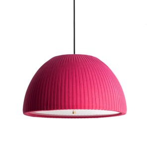 May include: A vibrant fuchsia pendant light with a pleated fabric shade. The dome-shaped shade hangs from a black cord, revealing a white interior and a brass-colored fixture. The light fixture is a modern design.
