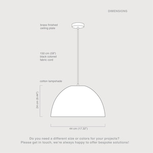 May include: A diagram of a pendant light fixture with a brass ceiling plate, a 150 cm (59") black fabric cord, and a cotton lampshade. The lampshade is 24 cm (9.44") high and 44 cm (17.32") wide. Text includes "DIMENSIONS".