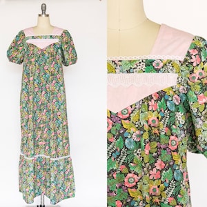 May include: A long, floral print dress with a pink and white lace trim. The dress has a square neckline and short puff sleeves.