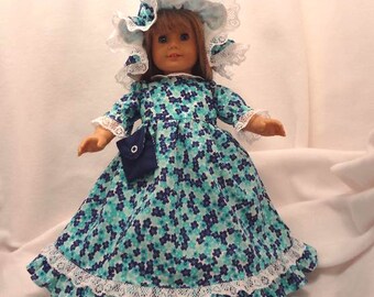 Turquoise and navy blue on white floral print, long dress for 18 inch dolls, with white lace trim.