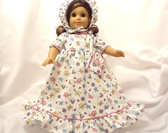 Whimsical pastel print on white, long dress for 18 inch dolls, with magenta baby rickrack trim.