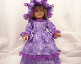 Purple and white print on lavender, long dress for 18 inch dolls, with purple lace trim.