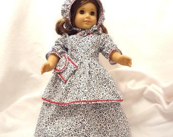 Black on white floral, long dress for 18 inch dolls,  with red baby rick rack trim.