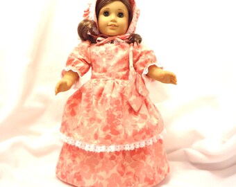 Shades of orange floral, long dress for 18 inch dolls, double skirted, with white lace trim.