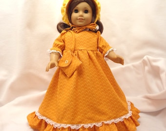 Yellowish orange, long dress for 18 inch dolls, with white lace trim.