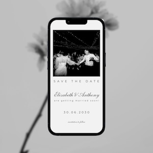 May include: A mobile phone screen shows a monochrome wedding announcement. The image features a couple dancing, with the text "Save the Date," the names "Elizabeth & Anthony," and the date "30.06.2030."