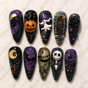 May include: A set of ten almond-shaped press-on nails featuring detailed 3D designs inspired by The Nightmare Before Christmas, including a jack-o'-lantern, Zero the ghost, a black rose, Oogie Boogie, Jack Skellington, and spooky houses.