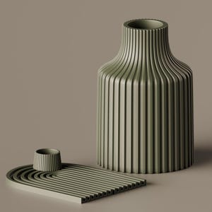 May include: A sage green decorative set featuring a ribbed vase, a small cylindrical candle holder, and a rectangular tray with a curved design. The vase is tall and cylindrical, and the candle holder is small and round. The tray has a series of parallel lines.