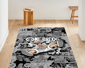 May include: A rectangular rug with a manga-style design. The rug features a central illustration of a character from the anime series "One Piece." The rug has a grey and white colour scheme, with comic panels forming the background.