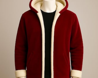 May include: A burgundy hooded jacket with a cream-coloured fleece lining and trim. The jacket features a full-length zip, a hood, and two front pockets. The cuffs are also trimmed with the cream-coloured fleece. The jacket is displayed on a mannequin.