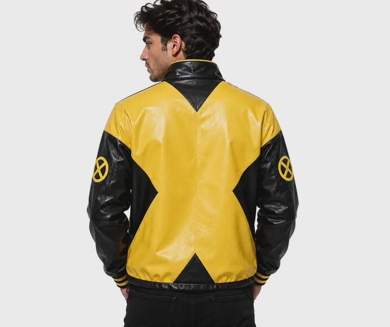 Pu&ograve; includere: Una giacca in pelle nera e gialla caratterizzata da un grande motivo a forma di X sul retro e loghi circolari gialli degli X-Men su entrambe le maniche. La giacca presenta un colletto alto, maniche lunghe con polsini a coste e vita nera.