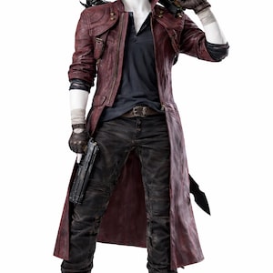 May include: A mannequin wearing a burgundy leather coat, black shirt, and distressed black trousers. A sword is over the shoulder, and a gun is held. The outfit includes fingerless gloves and boots.