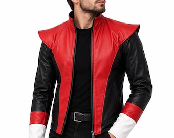 May include: A jacket featuring a red front panel with a high collar, black sleeves, and a red and white colour-blocked cuff design. The jacket has a central black zip closure and structured shoulder detailing, worn over a plain black shirt and black trousers.
