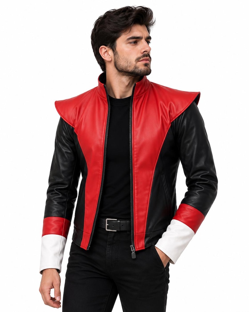 May include: A jacket featuring a red front panel with a high collar, black sleeves, and a red and white color-blocked cuff design. The jacket has a central black zipper closure and structured shoulder detailing, worn over a plain black shirt and black pants.