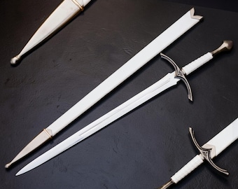 May include: A long sword with a white grip and a silver-toned crossguard, accompanied by a matching white scabbard. A separate, smaller dagger with a white handle and a silver-toned sheath is positioned in the upper left corner of the frame.