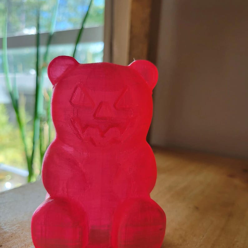 Quetschbarer Halloween-Gummibärchen, Kürbisgesicht, pinkfarbenes Fidget-Spielzeug (2 oder 4 Zoll) Bild 1