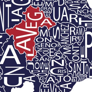 May include: A map of the Dominican Republic with the names of the provinces and districts written in white on a dark blue background. The province of La Vega is highlighted in red.