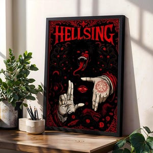 May include: Framed art print with the title "HELLSING" in red gothic lettering. The artwork shows a demonic figure with a long tongue and hands framing a central image, with a red pentagram tattoo. The background is black with red details.