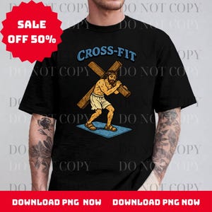 May include: Black t-shirt with a graphic of a person carrying a cross, with the text "CROSS-FIT" in blue. A red starburst graphic indicates a sale of 50% off. The shirt is a crew neck.
