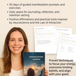 May include: A woman holds a "Manifestation Journal" with a blue cover. The journal's cover features an illustration of a person with arms raised towards a bright light. The journal promises 30 days of prompts, journaling space, and affirmations.