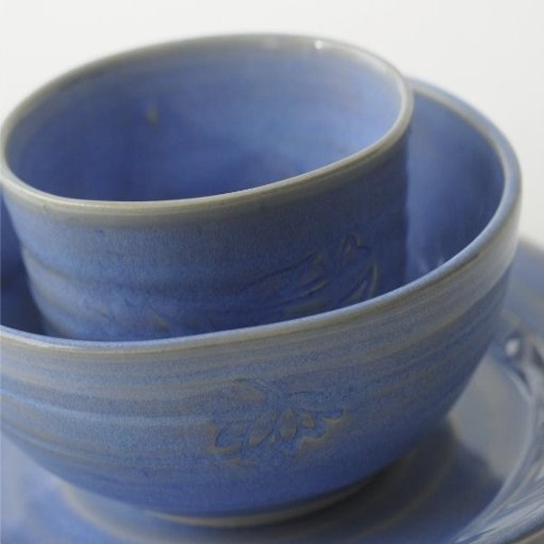 Blue ceramic child set of dishes-bowl, mug, plate.