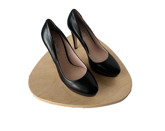 Zapatos de plataforma de cuero negro Miu Miu