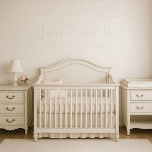 May include: A nursery setting with a white cot, a matching chest of drawers, and a changing table. A lamp and flowers are on the drawers. The wall has a subtle wave pattern. The text "Just Place It Blank Wall Mockups" is visible.