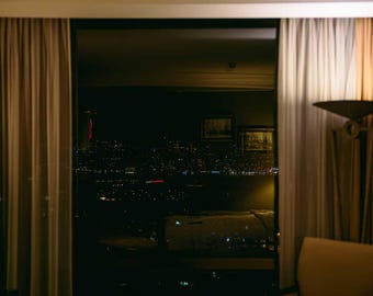 Moody Hotel Window Reflection – Istanbul Night Cityscape Wall Art – Dark Interior Photography