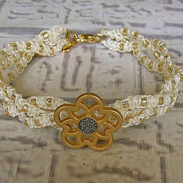 Macrame bracelet braided in white and gold. Macrame jewelry.