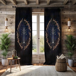 May include: Dark blue curtain panels with a white tree design inside a gold circular frame with text. The curtains hang in front of a window. The background of the design has a dark blue gradient. The curtains are in a room with wooden walls.