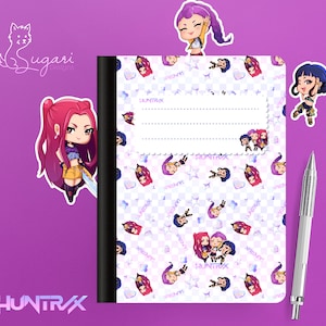 May include: A notebook with a patterned cover featuring cartoon characters, stars, and hearts. The notebook has a black spine and a blank label. A silver pen rests on the right. Decorative stickers of the characters are placed around the notebook. The word "HUNTRAX" is visible.