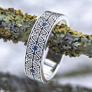 Oxidized Sterling Silver Ring, Triangular Knot Pattern, Blue Cubic Zirconia Band
